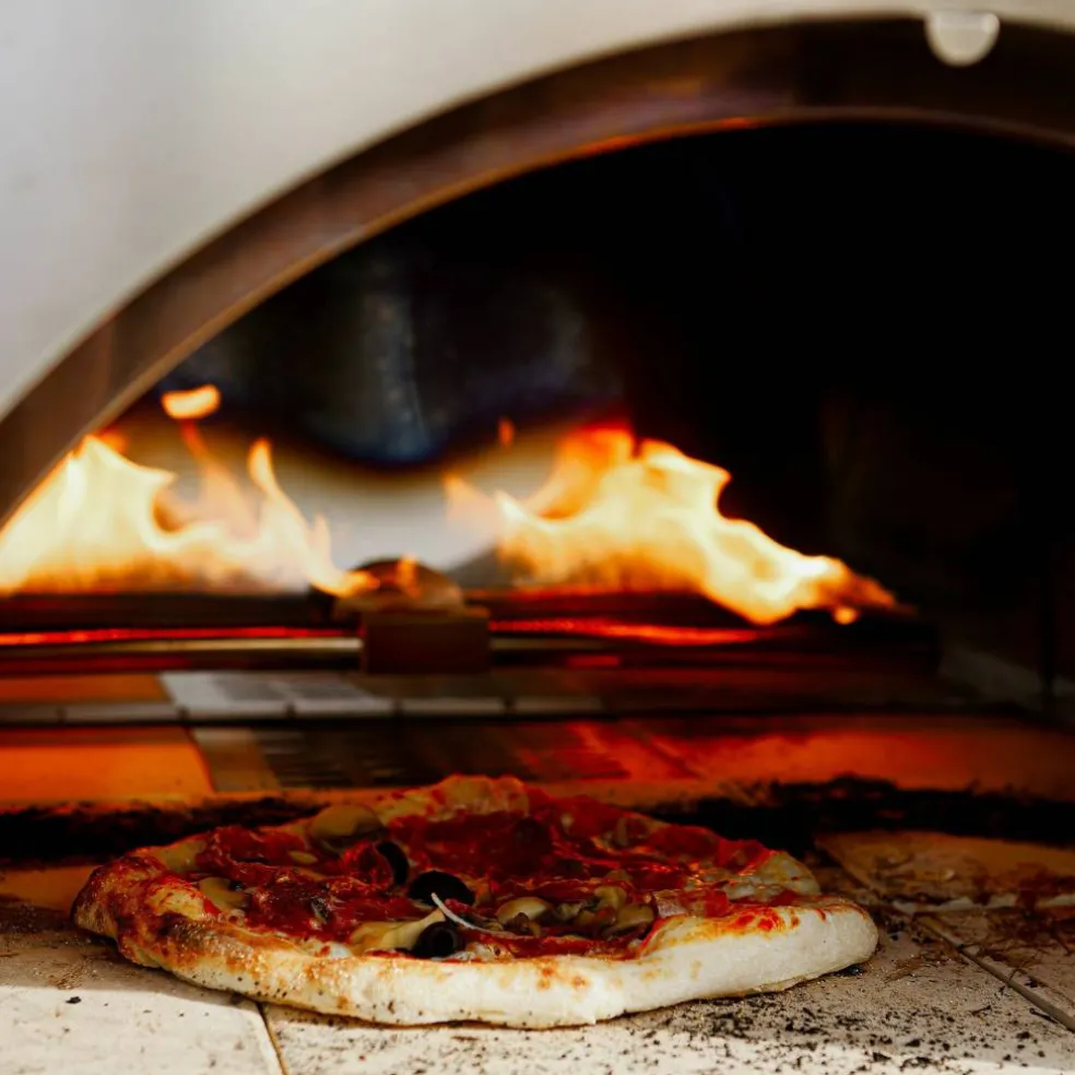 Pizzaovn på ved eller gass